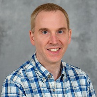 Justin Young's headshot